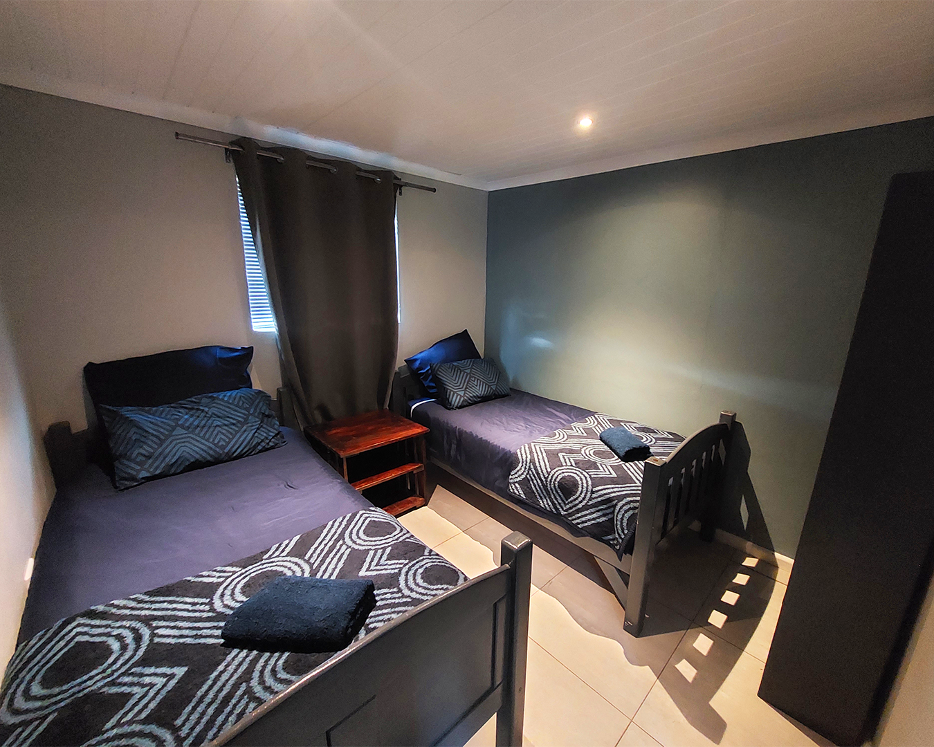 Farm cottage second bedroom with two single beds